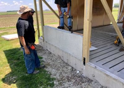 Hanson-installing-panels-to-hog-slat-floor-8B