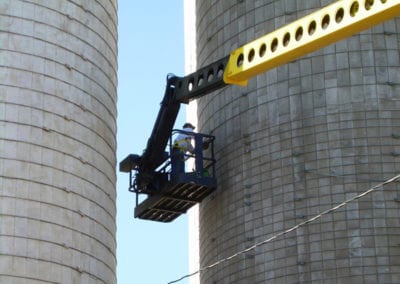 silo exterior repair with a crane